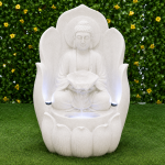 Buddha sitting on lotus flower water fountain