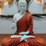 White and orange Buddha Resin Statue Murti
