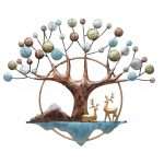 Deer sitting under tree metal wall hanging