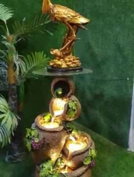 Swan Sitting On Matka fountain