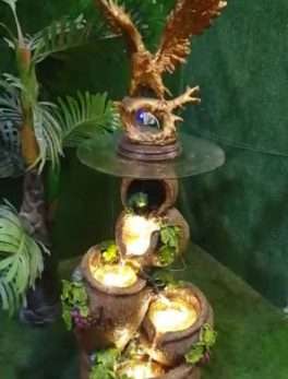 Egale Sitting On Matka Water Fountain