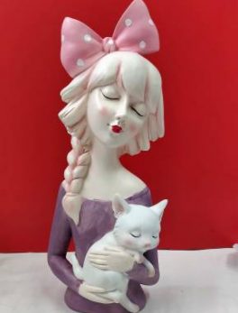 Leady holding cat idols