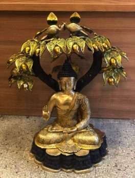 Brass Buddha Idol Under Tree