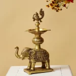 Peacock Brass Oil Diya lamp on elephant stand