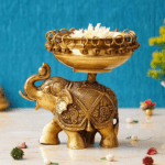 Brass Urli on Elephant Statue with Bells for Floating Flowers
