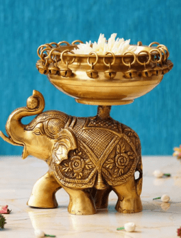 Brass Urli on Elephant Statue with Bells for Floating Flowers